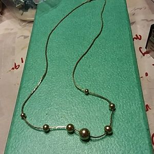 Gold bead necklace